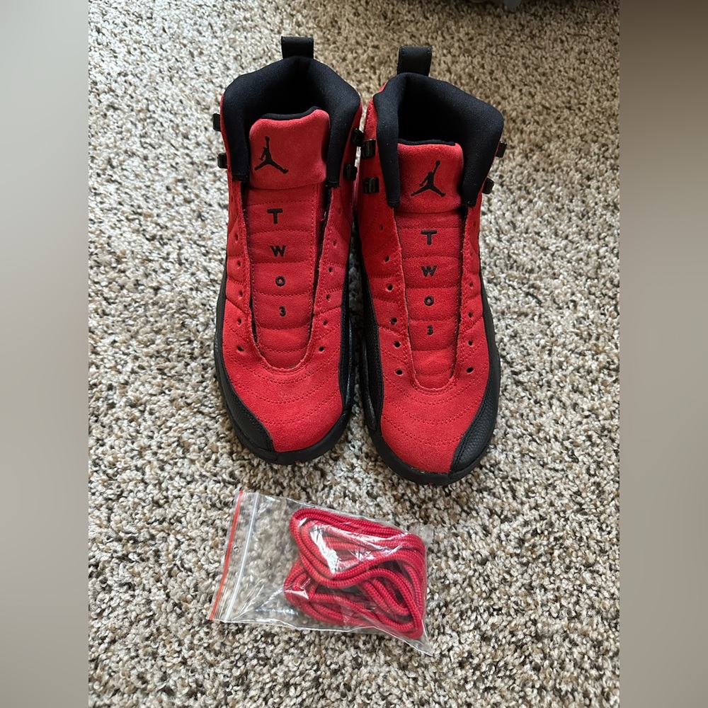 Red and black Jordan’s 5.5 youth